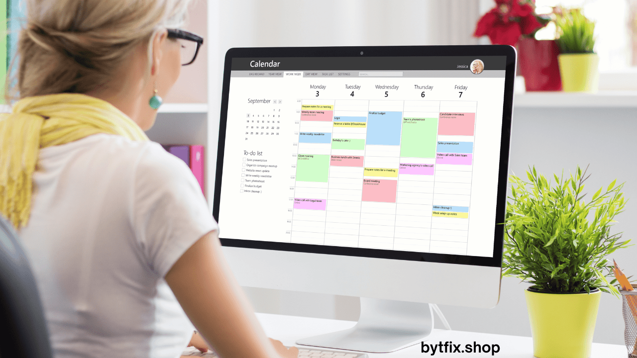 Virtual assistant managing a calendar on a laptop screen.